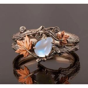 Moonstone Ring Surrounded by Branches and Leaves Fairy Tale Nature